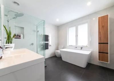 Sleek bathroom white marble walls