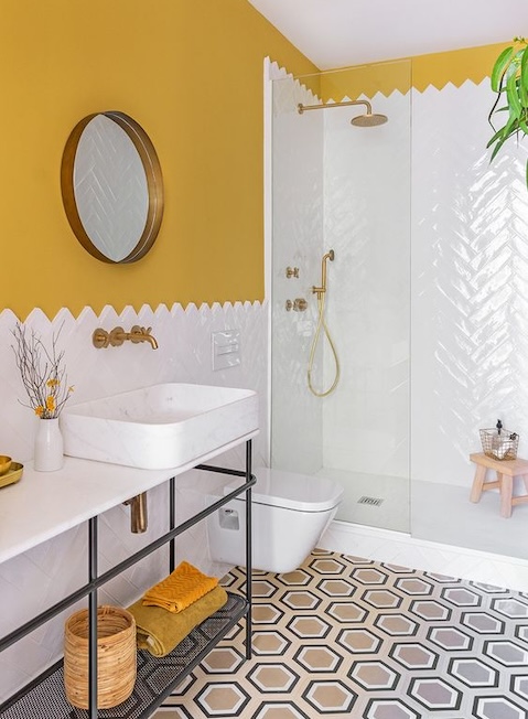 bold yellow bathroom Bold yellow wall with green cabinetry
