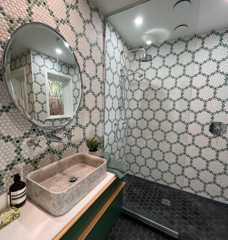 Interesting interiors using green mosaic tiles in flower pattern