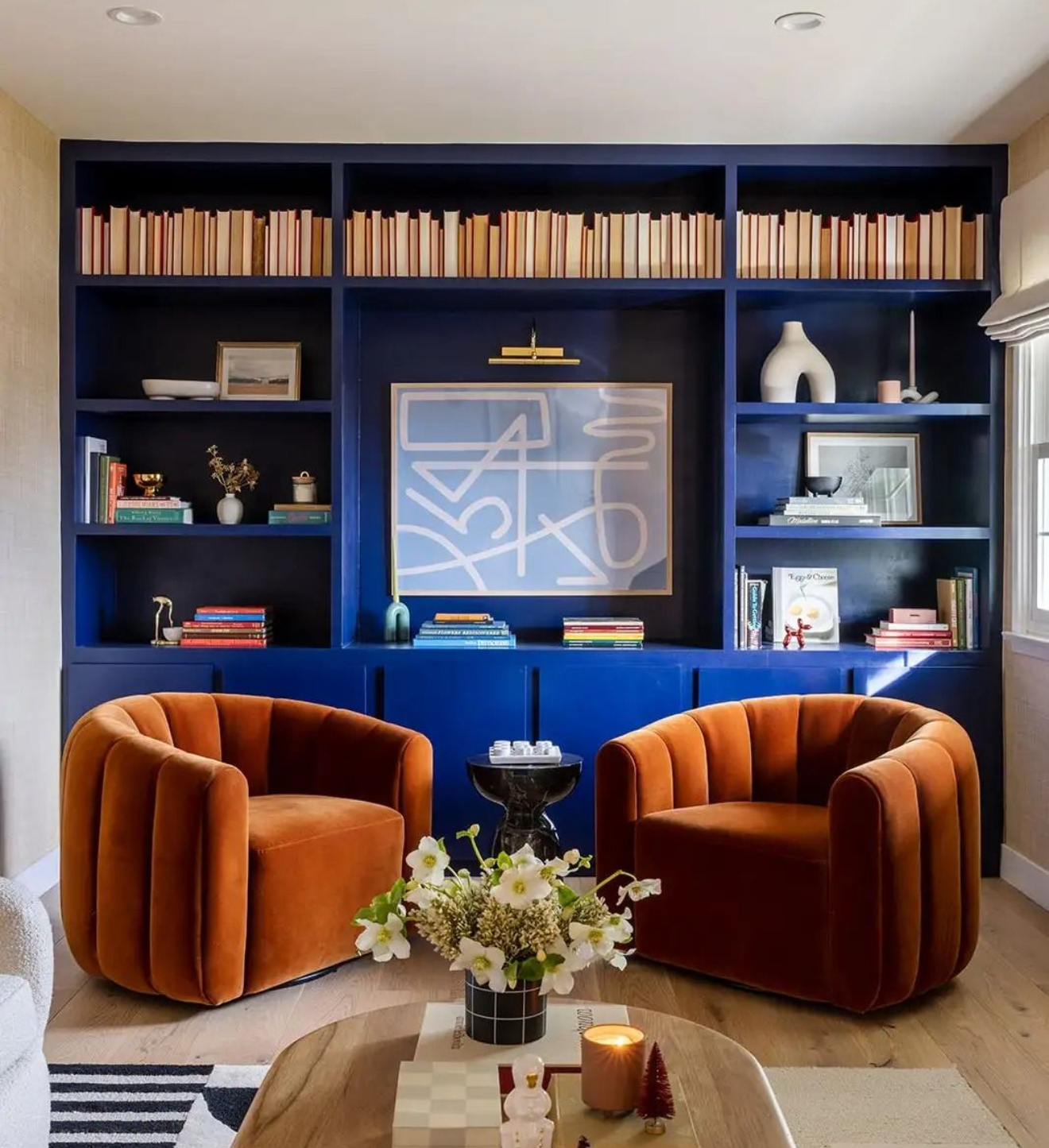 Luxury velvet chairs, simple painted bookcase